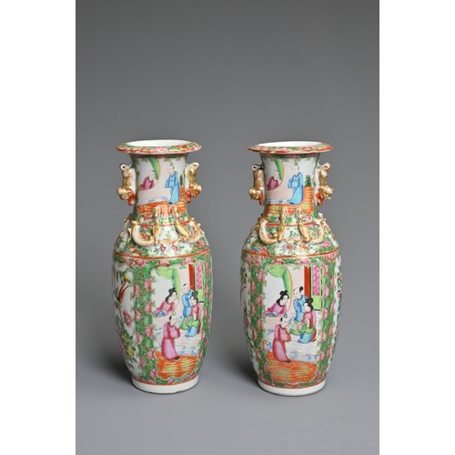 20 - A PAIR OF CHINESE CANTON FAMILLE ROSE PORCELAIN VASES, 19TH CENTURY. Rose Medallion decoration of fi... 