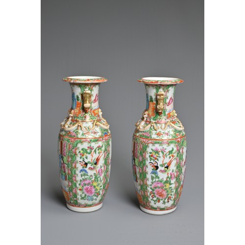 20 - A PAIR OF CHINESE CANTON FAMILLE ROSE PORCELAIN VASES, 19TH CENTURY. Rose Medallion decoration of fi... 