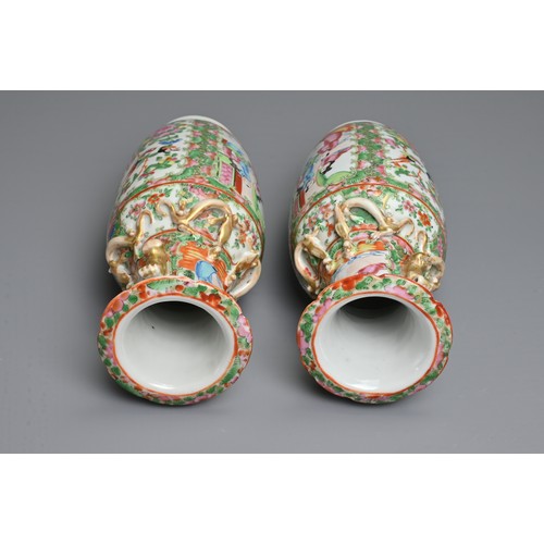 20 - A PAIR OF CHINESE CANTON FAMILLE ROSE PORCELAIN VASES, 19TH CENTURY. Rose Medallion decoration of fi... 