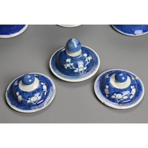 62 - THREE CHINESE BLUE AND WHITE PRUNUS JARS AND COVERS, 19/20TH CENTURY. Each of baluster form with dom... 