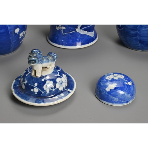 63 - THREE CHINESE BLUE AND WHITE PORCELAIN PRUNUS VASES, 19/20TH CENTURY. To include a baluster form vas... 