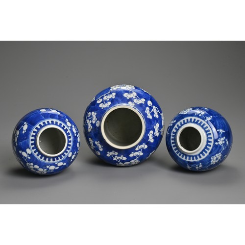 63 - THREE CHINESE BLUE AND WHITE PORCELAIN PRUNUS VASES, 19/20TH CENTURY. To include a baluster form vas... 