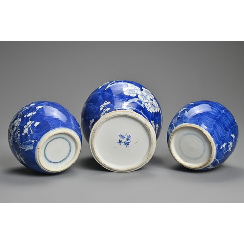 63 - THREE CHINESE BLUE AND WHITE PORCELAIN PRUNUS VASES, 19/20TH CENTURY. To include a baluster form vas... 