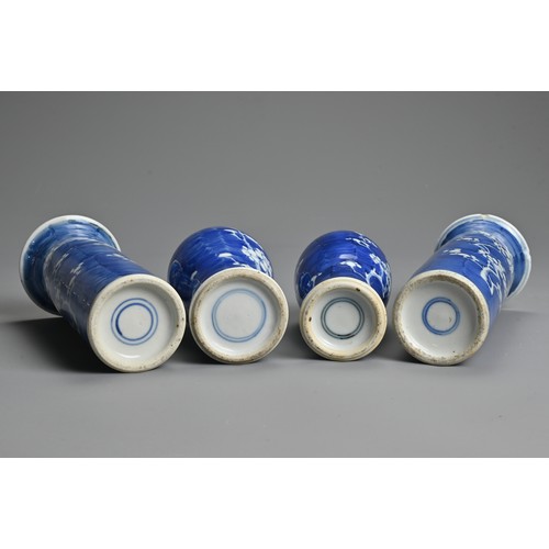 64 - FOUR CHINESE BLUE AND WHITE PORCELAIN PRUNUS VASES, 19/20TH CENTURY. To include two cylindrical slee... 