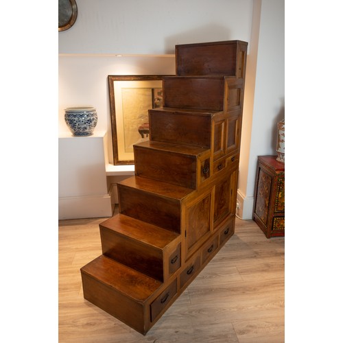 205 - EARLY 20TH CENTURY JAPANESE/KOREAN ELMWOOD STEPPED CABINET, in two sections, top faux drawer above a... 