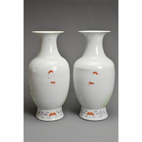 89 - A MIRRORED PAIR OF CHINESE FAMILLE ROSE PORCELAIN VASES, 20TH CENTURY. Decorated with children sat o... 