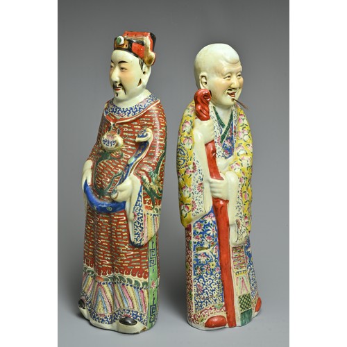 91 - TWO CHINESE POLYCHROME DECORATED PORCELAIN FIGURES, 20TH CENTURY. The Gods of fortune deities dresse... 