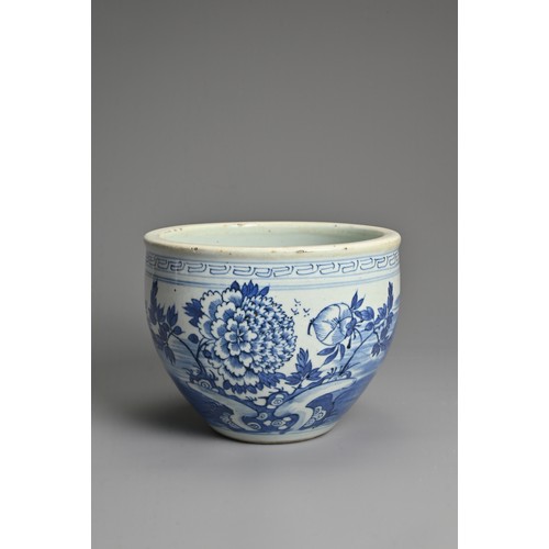 95 - A CHINESE BLUE AND WHITE PORCELAIN JARDINIERE, 19TH CENTURY. Decorated with a garden scene under a b... 