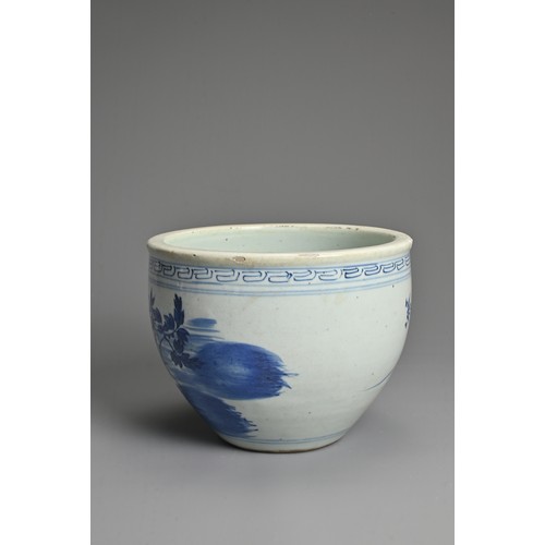 95 - A CHINESE BLUE AND WHITE PORCELAIN JARDINIERE, 19TH CENTURY. Decorated with a garden scene under a b... 