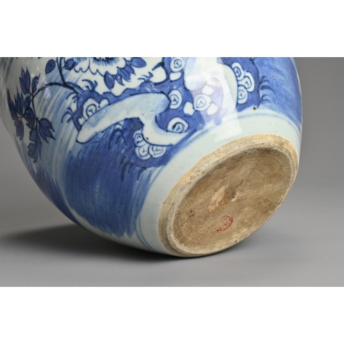 95 - A CHINESE BLUE AND WHITE PORCELAIN JARDINIERE, 19TH CENTURY. Decorated with a garden scene under a b... 