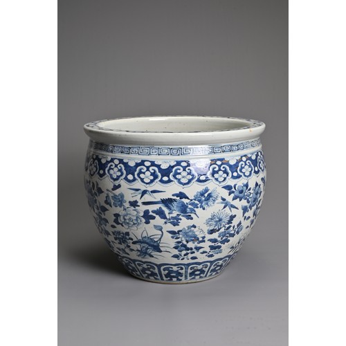 55 - A LARGE CHINESE BLUE AND WHITE PORCELAIN JARDINIERE, 19TH CENTURY. Decorated with birds, butterflies... 