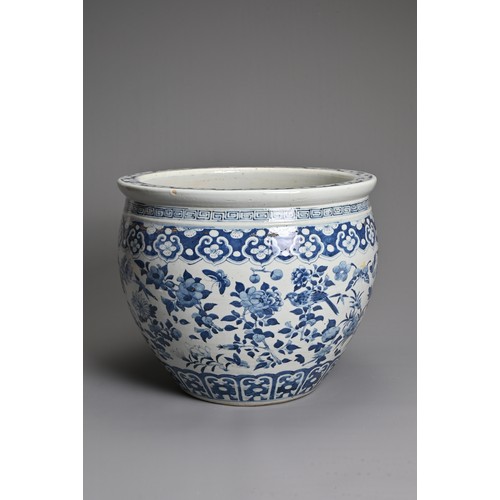 55 - A LARGE CHINESE BLUE AND WHITE PORCELAIN JARDINIERE, 19TH CENTURY. Decorated with birds, butterflies... 