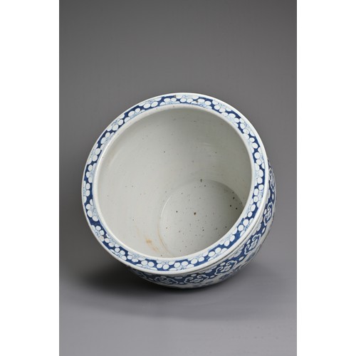 55 - A LARGE CHINESE BLUE AND WHITE PORCELAIN JARDINIERE, 19TH CENTURY. Decorated with birds, butterflies... 