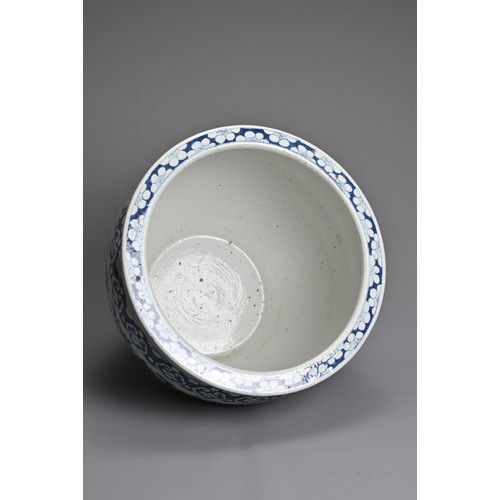 55 - A LARGE CHINESE BLUE AND WHITE PORCELAIN JARDINIERE, 19TH CENTURY. Decorated with birds, butterflies... 