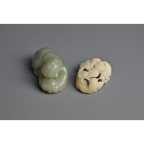 107 - TWO CHINESE JADE AND STONE CARVINGS. To include a pale celadon nephrite jade figure of a boy crouche... 