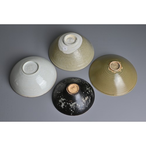 122 - FOUR CHINESE CERAMIC BOWLS, SONG DYNASTY AND LATER. To include a Yaozhou type bowl decorated with fi... 