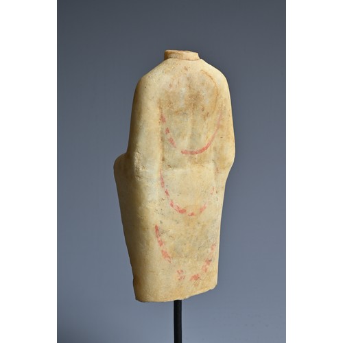 117 - A CHINESE PAINTED WHITE MARBLE TORSO OF BUDDHA, probably Northern Qi Dynasty and purchased in Hong K... 