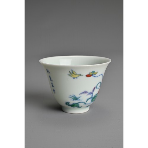 174 - A SMALL CHINESE DOUCAI PORCELAIN WINE CUP, KANGXI MARK. Finely potted, decorated to the exterior wit... 