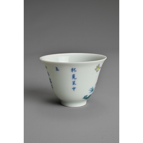 174 - A SMALL CHINESE DOUCAI PORCELAIN WINE CUP, KANGXI MARK. Finely potted, decorated to the exterior wit... 