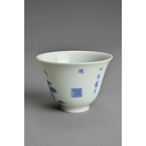 174 - A SMALL CHINESE DOUCAI PORCELAIN WINE CUP, KANGXI MARK. Finely potted, decorated to the exterior wit... 