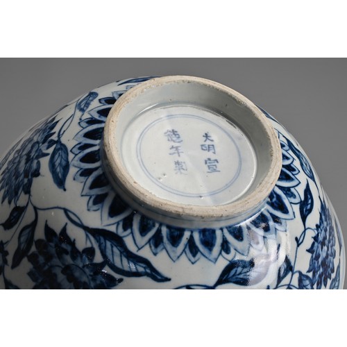 173 - A CHINESE BLUE AND WHITE PORCELAIN BOWL, 18/19TH CENTURY. Heavily potted decorated to the interior w... 