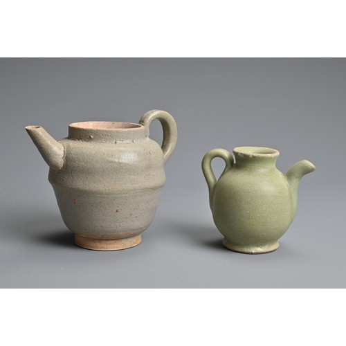 162 - TWO CHINESE GLAZED POTTERY EWERS, YUAN / MING DYNASTY. The larger ewer covered in a greyish glaze an... 