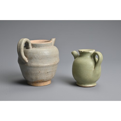 162 - TWO CHINESE GLAZED POTTERY EWERS, YUAN / MING DYNASTY. The larger ewer covered in a greyish glaze an... 