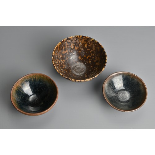 160 - THREE CHINESE POTTERY TEA BOWLS, SONG DYNASTY 12/13TH CENTURY. A Jizhou tortoise shell glazed bowl w... 