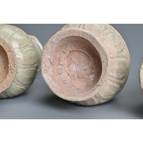 155 - THREE CHINESE QINGBAI WARE VASES, YUAN DYNASTY (1279 – 1368). Each similarly decorated with bands of... 