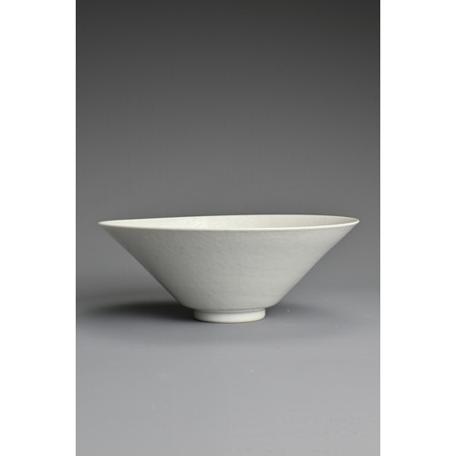 151 - A CHINESE WHITE GLAZED MONOCHROME PORCELAIN CONICAL BOWL, 18TH CENTURY. Finely potted covered in an ... 