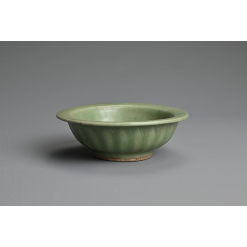 150 - A CHINESE LONGQUAN CELADON TWIN FISH DISH WITH FOUR CHARACTER MARK, YUAN DYNASTY OR LATER. Thickly p... 