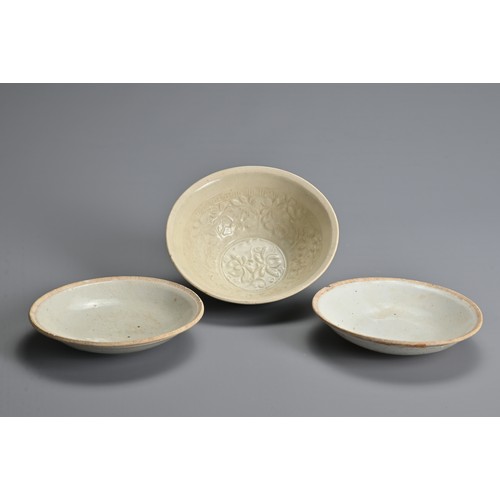 149 - THREE CHINESE QINGBAI WARE PORCELAIN ITEMS, SONG DYNASTY (960–1279). To include a nicely moulded bow... 