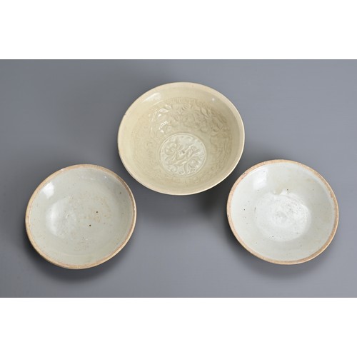 149 - THREE CHINESE QINGBAI WARE PORCELAIN ITEMS, SONG DYNASTY (960–1279). To include a nicely moulded bow... 