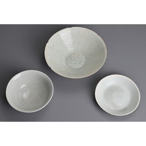 148 - THREE CHINESE QINGBAI WARE PORCELAIN ITEMS, SONG DYNASTY (960–1279). To include a bowl with combed d... 