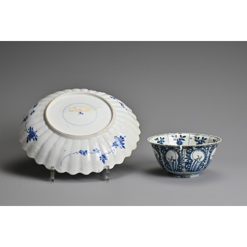 147 - A CHINESE BLUE AND WHITE PORCELAIN DISH, KANGXI PERIOD (1662-1722). With lobbed rim decorated with v... 