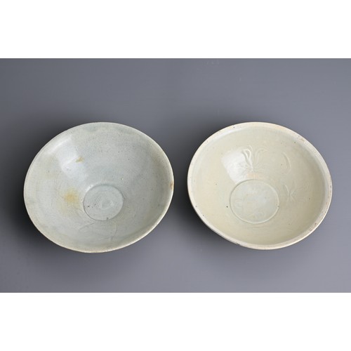 142 - TWO CHINESE QINGBAI WARE BOWLS, SOUTHERN SONG DYNASTY (1127–1279). One with petal decoration to the ... 