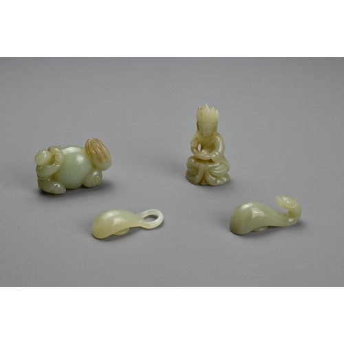 78 - THREE CHINESE CARVED CELADON JADE ITEMS. To include a seated figure of Buddha; A carving of a boy on... 