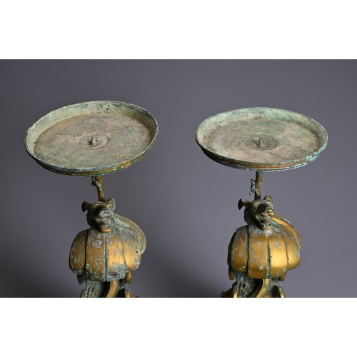 183 - A LARGE PAIR OF CHINESE ARCHAIC STYLE GILT BRONZE PHOENIX CANDLESTICKS. Elaborately cast in the form... 