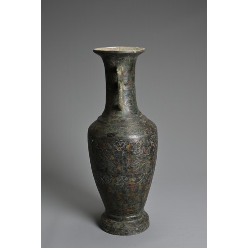 233 - A JAPANESE INLAID BRONZE VASE. Of baluster form with twin handles, wire inlaid depicting archaistic ... 