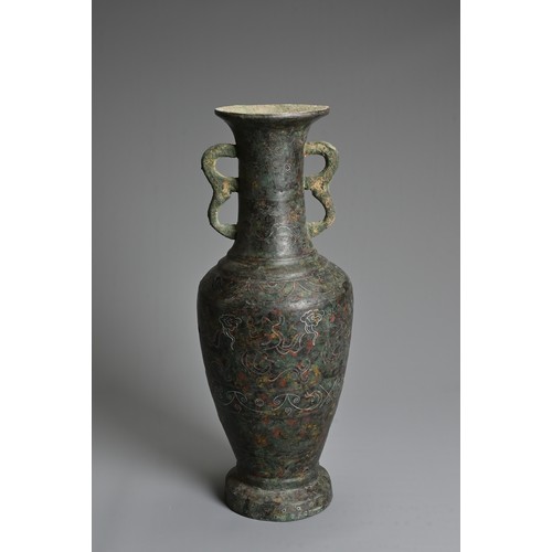 233 - A JAPANESE INLAID BRONZE VASE. Of baluster form with twin handles, wire inlaid depicting archaistic ... 