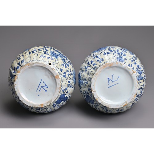 269 - A PAIR OF DUTCH DELFT BLUE AND WHITE FLUTED DOUBLE GOURD-SHAPED BOTTLE VASES AND A HEXAGONAL SECTION... 