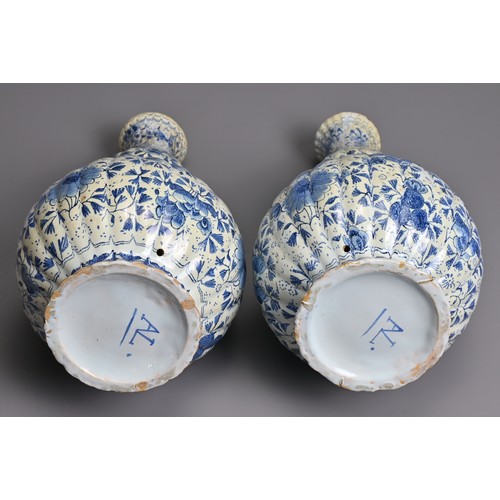 269 - A PAIR OF DUTCH DELFT BLUE AND WHITE FLUTED DOUBLE GOURD-SHAPED BOTTLE VASES AND A HEXAGONAL SECTION... 