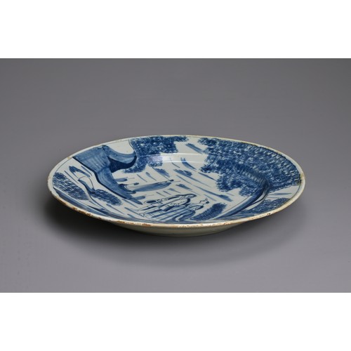 268 - AN ENGLISH DELFTWARE BLUE AND WHITE LARGE PLATE, MID-18TH CENTURY PERHAPS BRISTOL OR LONDON. Painted... 