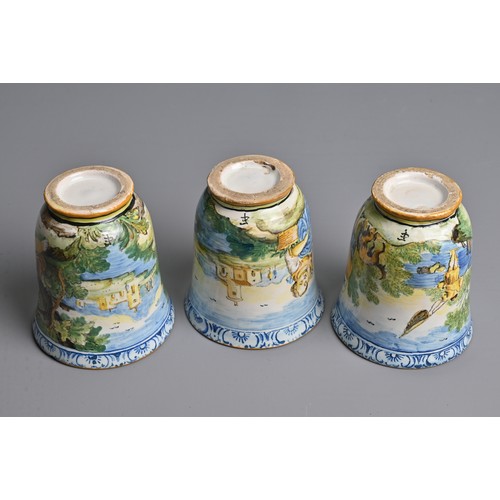 270 - THREE ITALIAN MAIOLICA CASTELLI-STYLE FLARED BEAKERS, 18-19TH CENTURY. Painted with rustic figures a... 