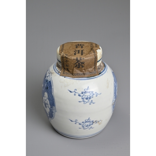 45 - A CHINESE BLUE AND WHITE PORCELAIN JAR AND COVER WITH TEA LABELS. The jar decorated with figures of ... 