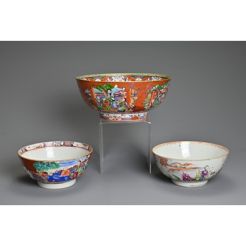 37 - THREE CHINESE FAMILLE ROSE PORCELAIN BOWLS, 18TH CENTURY. Of graduating sizes decorated with various... 