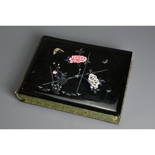 250 - A JAPANESE LACQUER PHOTOGRAPH ALBUM, EARLY 20TH CENTURY. Leather spine with black lacquered covers i... 