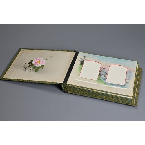 250 - A JAPANESE LACQUER PHOTOGRAPH ALBUM, EARLY 20TH CENTURY. Leather spine with black lacquered covers i... 