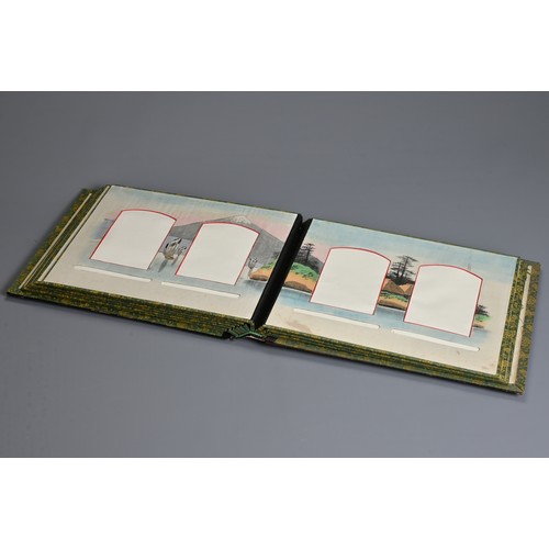 250 - A JAPANESE LACQUER PHOTOGRAPH ALBUM, EARLY 20TH CENTURY. Leather spine with black lacquered covers i... 