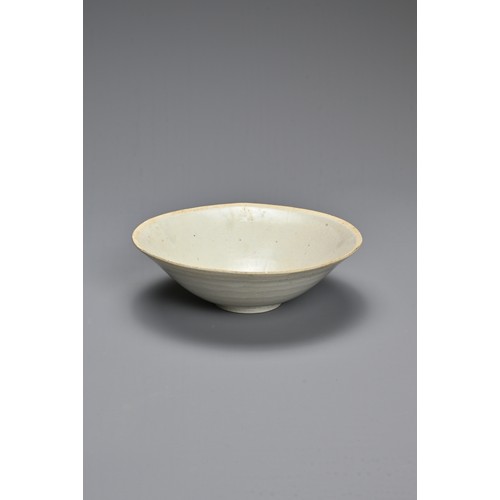 170 - A CHINESE LONGQUAN BOWL, SONG DYNASTY. Of flared form, with everted rim in pale greyish glaze, the c... 